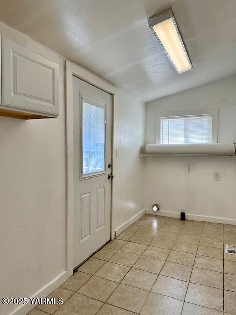 1115 S 20th Ave `, Unit Yakima, WA 98902 - doorway featuring light tile patterned flooring and baseboards
