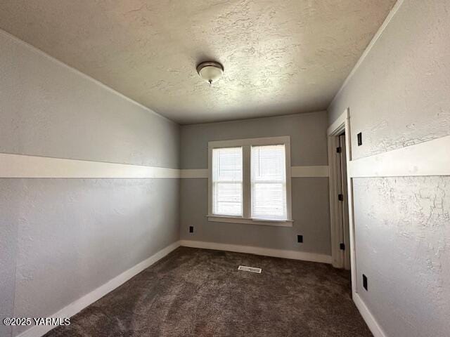 1115 S 20th Ave `, Unit Yakima, WA 98902 - empty room with carpet floors, a textured ceiling, and baseboards