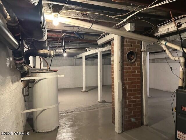 1115 S 20th Ave `, Unit Yakima, WA 98902 - unfinished below grade area with strapped water heater