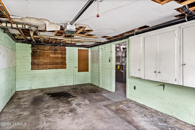 garage featuring wood walls