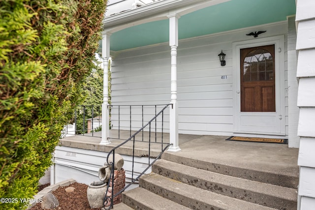doorway to property with covered porch