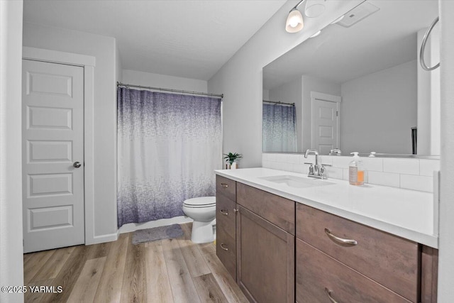 19700 N Beers Rd, Prosser, WA 99350 - bathroom featuring vanity, wood finished floors, and a shower with shower curtain
