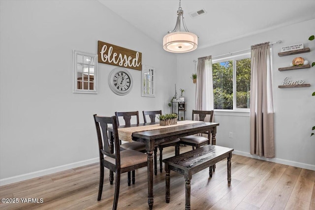 19700 N Beers Rd, Prosser, WA 99350 - dining area with light wood-style flooring and lofted ceiling
