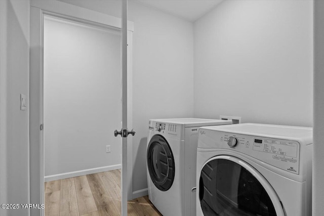 19700 N Beers Rd, Prosser, WA 99350 - laundry area featuring separate washer and dryer and light wood-style flooring
