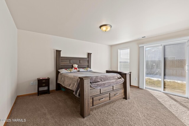 bedroom with access to exterior, carpet, visible vents, and baseboards