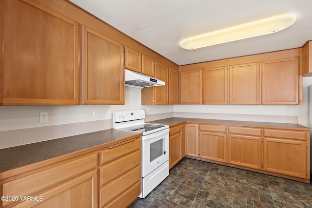 kitchen with white electric range, stone finish floor, dark countertops, and under cabinet range hood