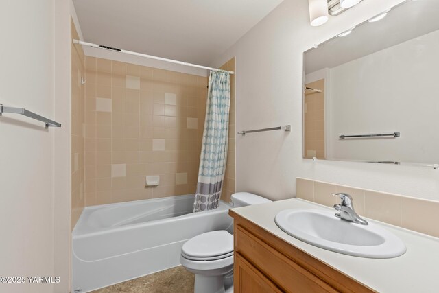 bathroom with vanity, shower / bath combo with shower curtain, and toilet