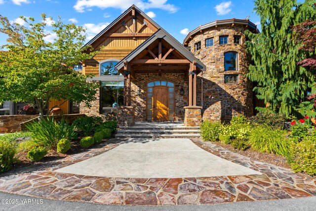 view of front of house featuring stone siding