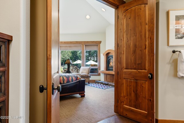 carpeted bedroom with lofted ceiling and recessed lighting