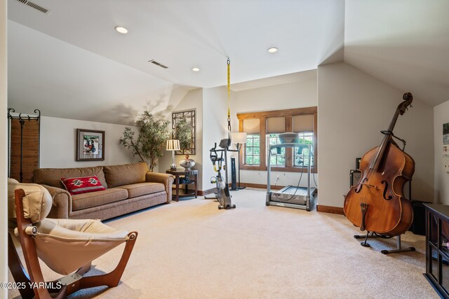 carpeted living room featuring lofted ceiling, baseboards, visible vents, and recessed lighting