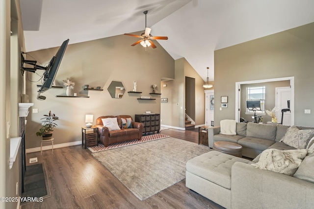 7302 Crown Crest Ave, Yakima, WA 98903 - living room with high vaulted ceiling, ceiling fan, stairway, dark wood finished floors, and baseboards