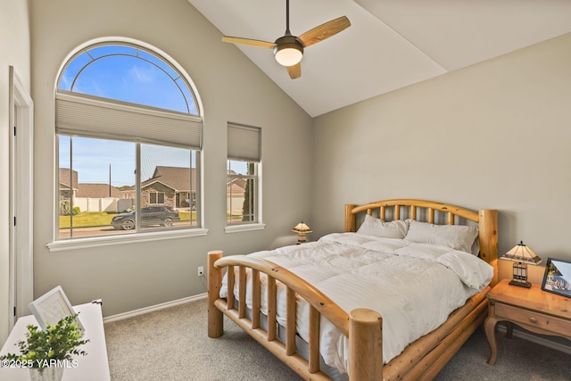 7302 Crown Crest Ave, Yakima, WA 98903 - carpeted bedroom featuring multiple windows, baseboards, high vaulted ceiling, and ceiling fan