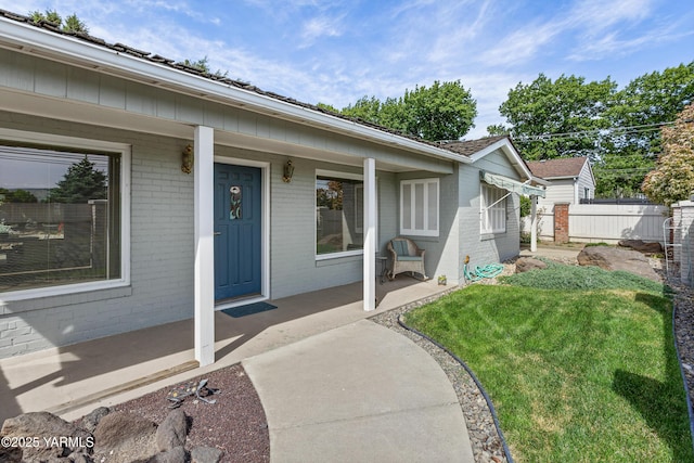4405 Summitview Ave, Yakima, WA 98908 - entrance to property with brick siding, covered porch, and a lawn