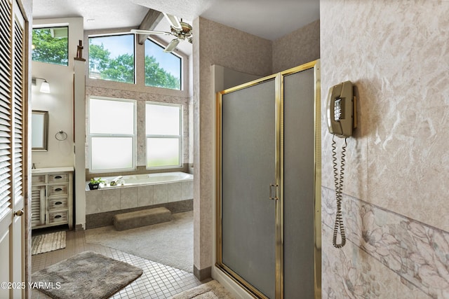 4405 Summitview Ave, Yakima, WA 98908 - bathroom featuring vanity, a ceiling fan, a stall shower, and a garden tub