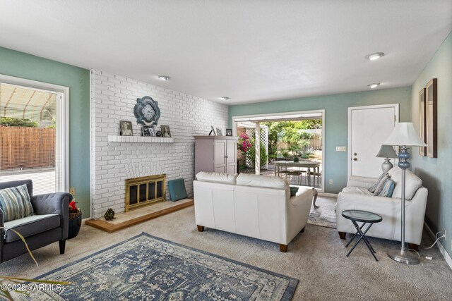 4405 Summitview Ave, Yakima, WA 98908 - carpeted living area with a fireplace and baseboards
