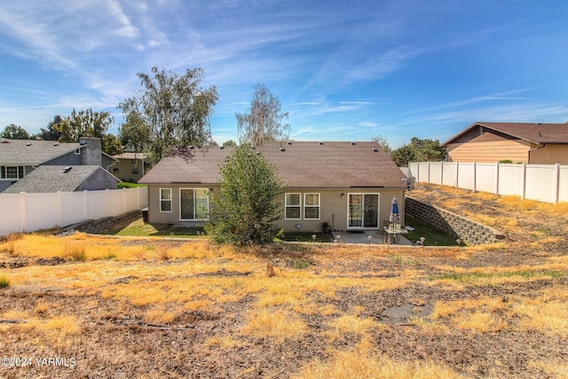 617 Westwind Dr, Zillah, WA 98953 - rear view of property featuring a patio area and a fenced backyard