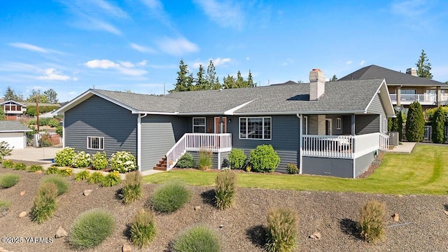 7905 Englewood Ave, Yakima, WA 98908 - single story home featuring a chimney, a front lawn, roof with shingles, a porch, and central air condition unit