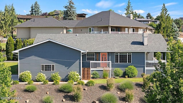 7905 Englewood Ave, Yakima, WA 98908 - view of front of home featuring stairs, a chimney, and a shingled roof