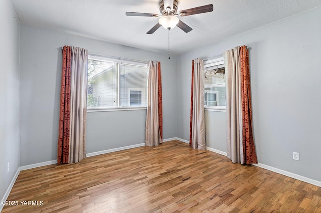 118 Glen Dr, Zillah, WA 98953 - empty room with wood finished floors and a ceiling fan
