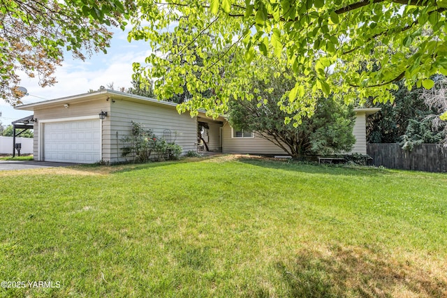 118 Glen Dr, Zillah, WA 98953 - view of yard featuring an attached garage and driveway
