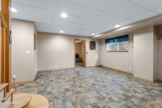 118 Glen Dr, Zillah, WA 98953 - below grade area featuring stone finish floors, a drop ceiling, and recessed lighting