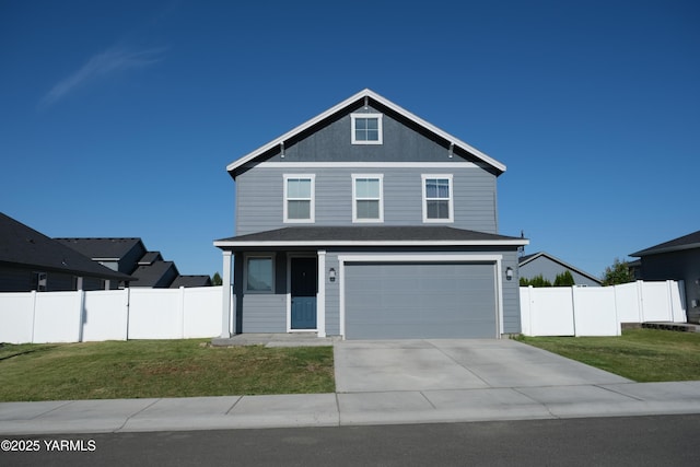 2206 Porter Loop, Yakima, WA 98901 - view of front of house featuring an attached garage and concrete driveway