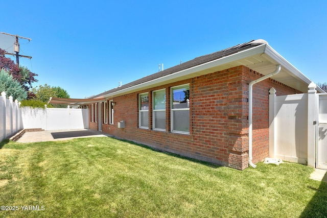 6119 Summitview Ave # 1, Yakima, WA 98908 - rear view of property featuring brick siding and a patio