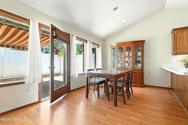 6119 Summitview Ave # 1, Yakima, WA 98908 - dining area featuring french doors, vaulted ceiling, light wood-style flooring, and recessed lighting