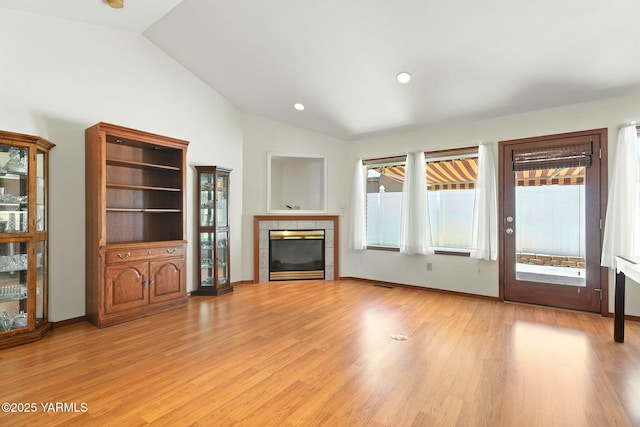 6119 Summitview Ave # 1, Yakima, WA 98908 - unfurnished living room with lofted ceiling, a fireplace, light wood-type flooring, and recessed lighting