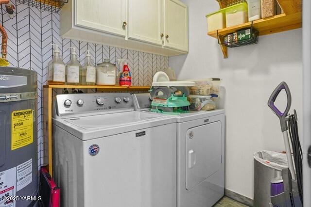 1319 S 15th Ave, Yakima, WA 98902 - laundry area with washing machine and dryer, water heater, and cabinet space