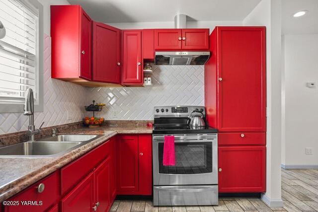 1319 S 15th Ave, Yakima, WA 98902 - kitchen featuring range hood, electric stove, and red cabinets