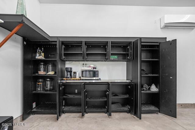 1319 S 15th Ave, Yakima, WA 98902 - bar featuring stainless steel microwave and a wall mounted AC