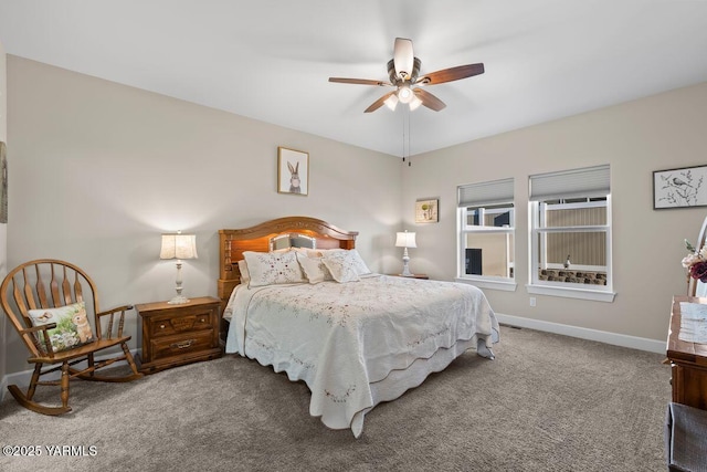 carpeted bedroom featuring ceiling fan and baseboards