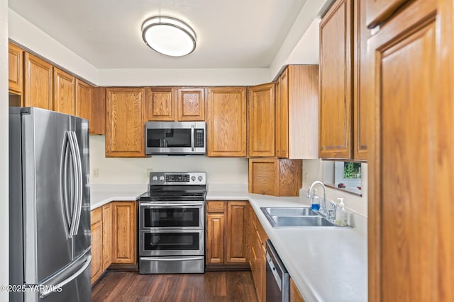 1531 Old Stage Way, Yakima, WA 98908 - kitchen featuring appliances with stainless steel finishes, brown cabinetry, and light countertops