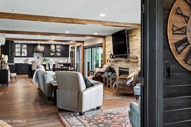 1355 Cook Rd, Yakima, WA 98908 - living room with beamed ceiling, wood finished floors, recessed lighting, and a stone fireplace
