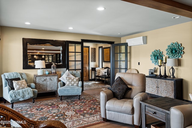 1355 Cook Rd, Yakima, WA 98908 - living area featuring wood finished floors, an AC wall unit, and recessed lighting