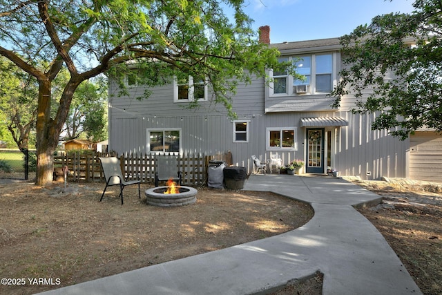 2810 Butterfield Rd, Yakima, WA 98901 - back of house featuring an outdoor fire pit, a chimney, and a patio