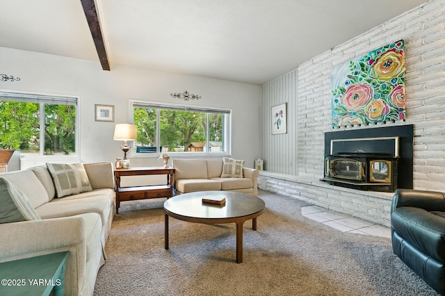 2810 Butterfield Rd, Yakima, WA 98901 - carpeted living area featuring a wood stove and beam ceiling