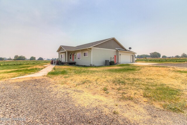 single story home featuring a garage