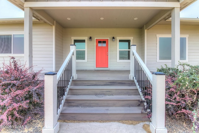 entrance to property with a porch