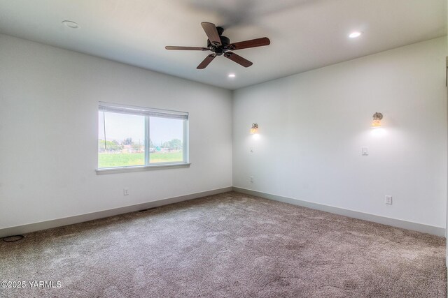 carpeted spare room with recessed lighting, baseboards, and ceiling fan