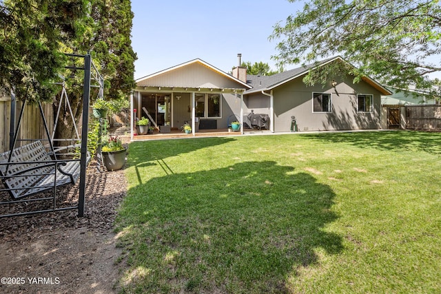 5504 Webster Ave, Yakima, WA 98908 - back of house with a fenced backyard, a patio, and a chimney