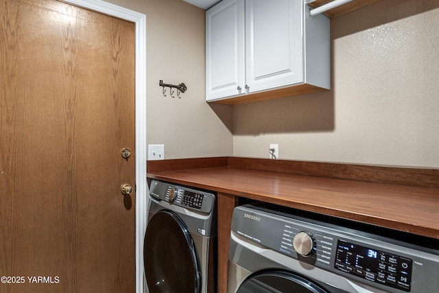 5504 Webster Ave, Yakima, WA 98908 - laundry room featuring cabinet space and separate washer and dryer