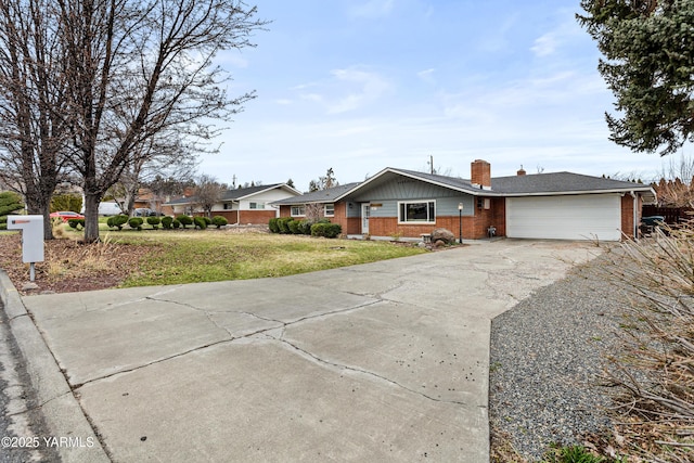 ranch-style house with driveway, a front lawn, an attached garage, brick siding, and a chimney