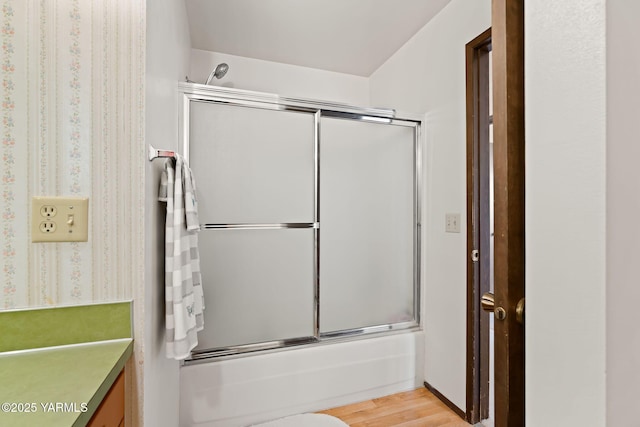 10800 Zier Rd, Yakima, WA 98908 - bathroom featuring combined bath / shower with glass door, wood finished floors, vanity, and toilet