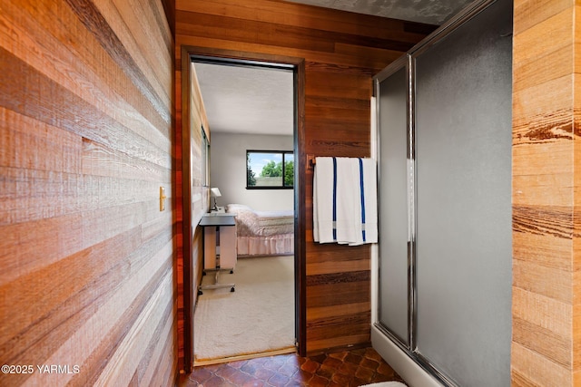 10800 Zier Rd, Yakima, WA 98908 - hall with wooden walls, dark colored carpet, and dark tile patterned floors