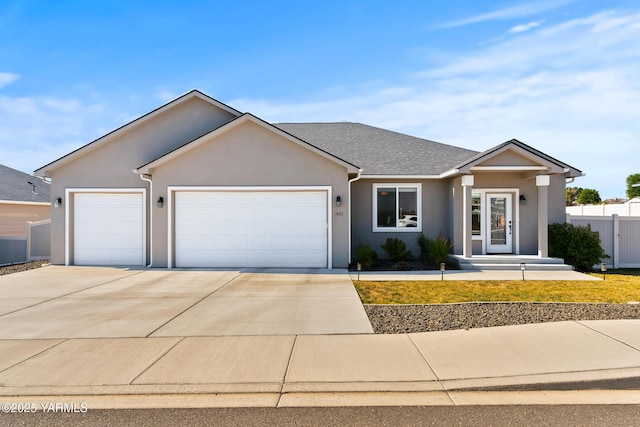 7402 Viewcrest Way, Yakima, WA 98908 - ranch-style home with an attached garage, driveway, and stucco siding