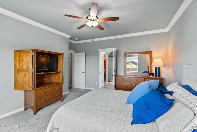 7402 Viewcrest Way, Yakima, WA 98908 - bedroom featuring crown molding, light colored carpet, a walk in closet, and ceiling fan