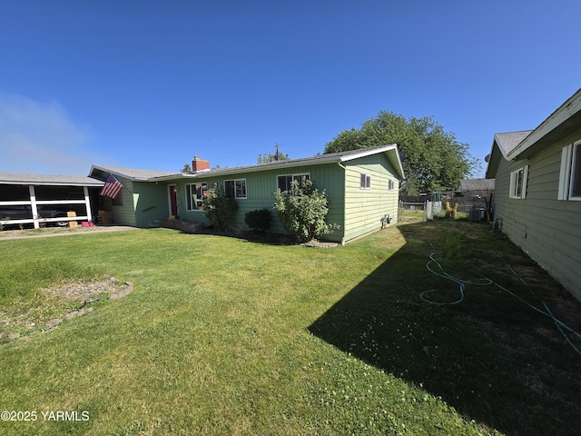 3204 W Viola Ave, Yakima, WA 98902 - back of house featuring a chimney
