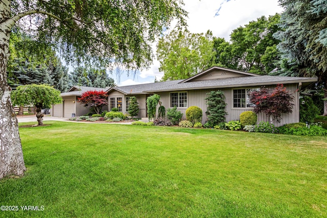3012 S 79th Ave, Yakima, WA 98903 - ranch-style house featuring a garage, a front yard, driveway, and a shingled roof